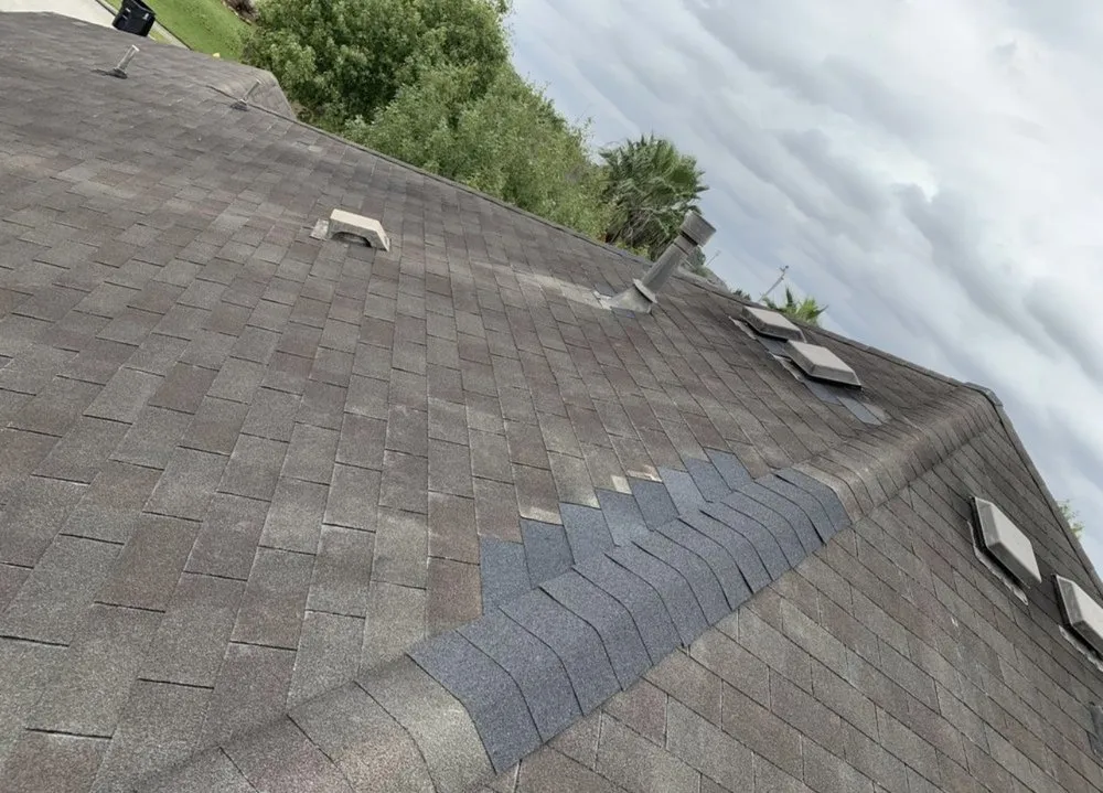 Slide of Redeemer Roofing