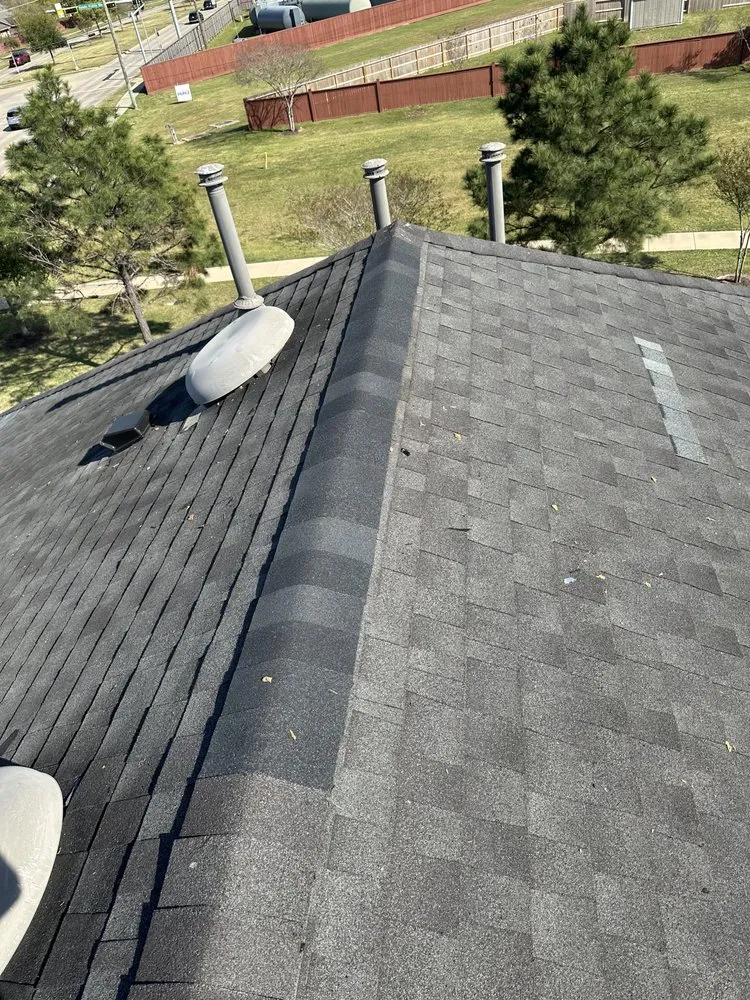 Slide of Redeemer Roofing