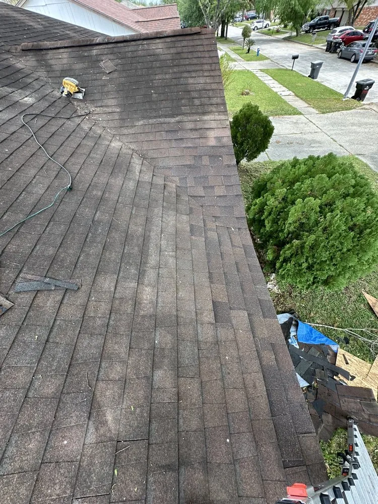 Slide of Redeemer Roofing