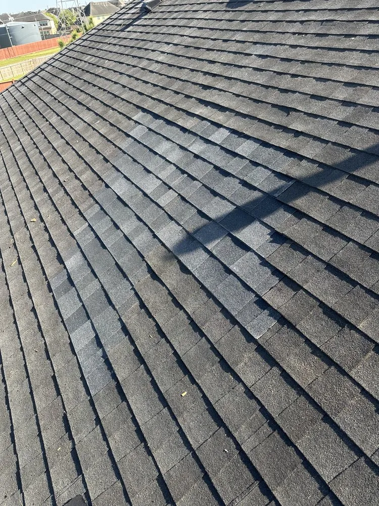 Slide of Redeemer Roofing