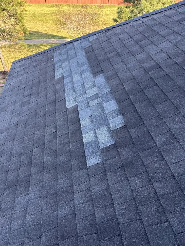 Slide of Redeemer Roofing