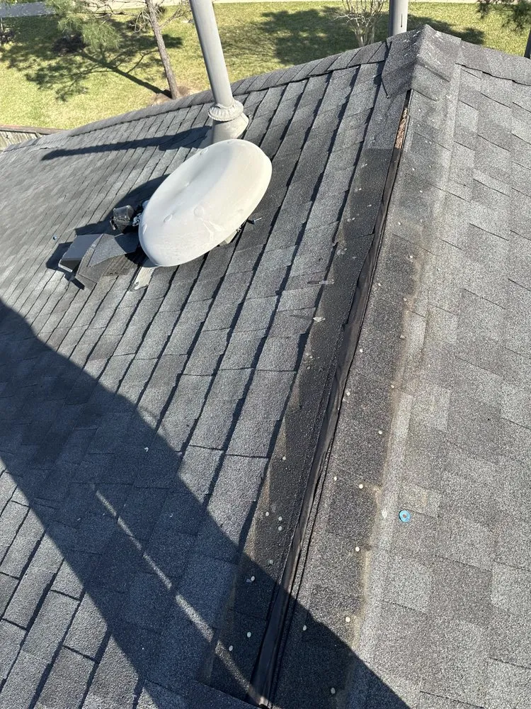 Slide of Redeemer Roofing