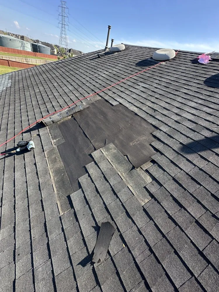 Slide of Redeemer Roofing