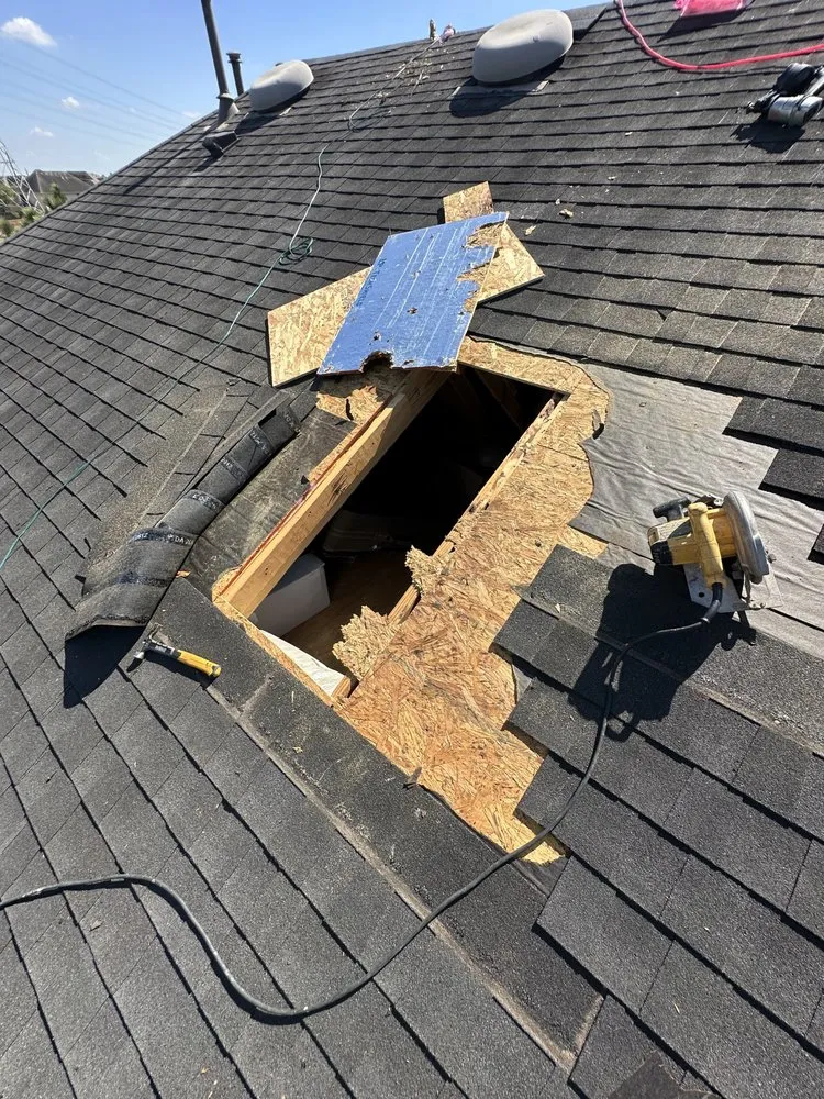 Slide of Redeemer Roofing