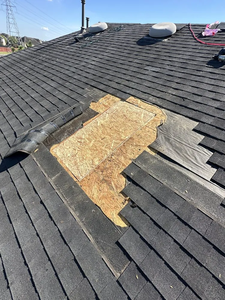 Slide of Redeemer Roofing