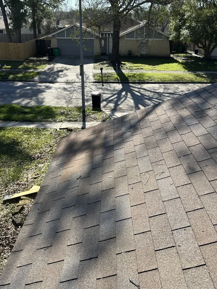 Slide of Redeemer Roofing