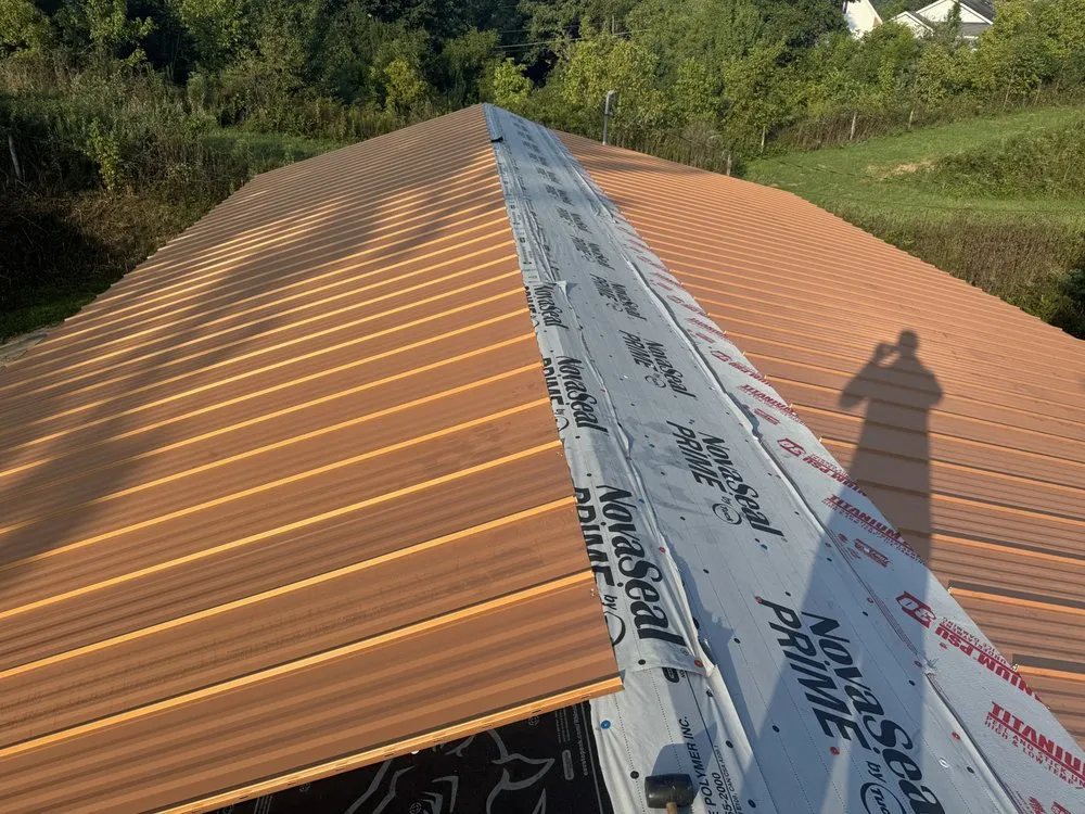 Slide of Redemption Roofing & Construction