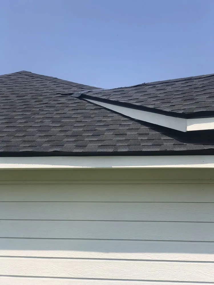 Slide of Redfish Roofing Company