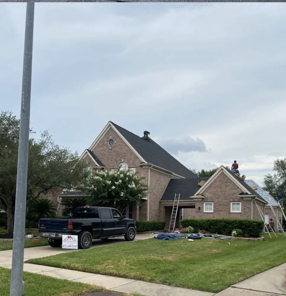 Slide of Redfish Roofing Company