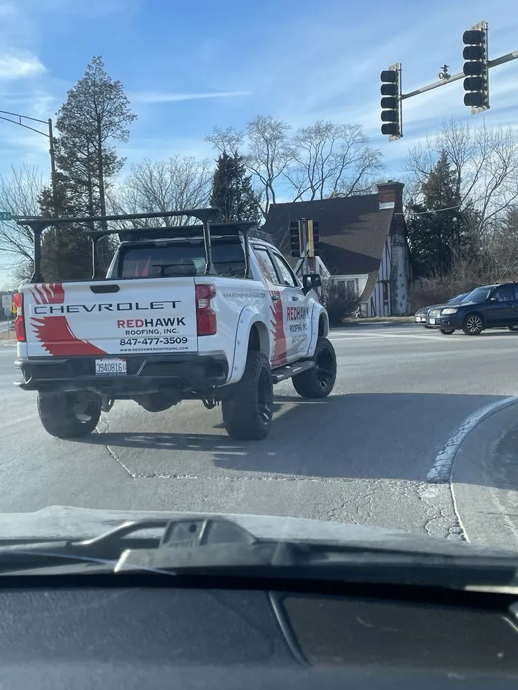 Slide of Redhawk Roofing