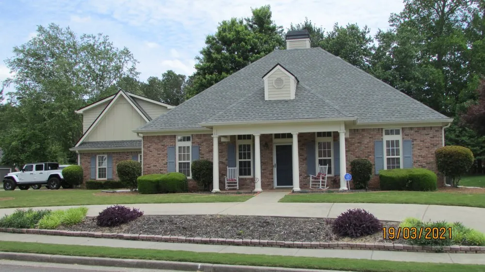 Slide of RedHawk Roofing
