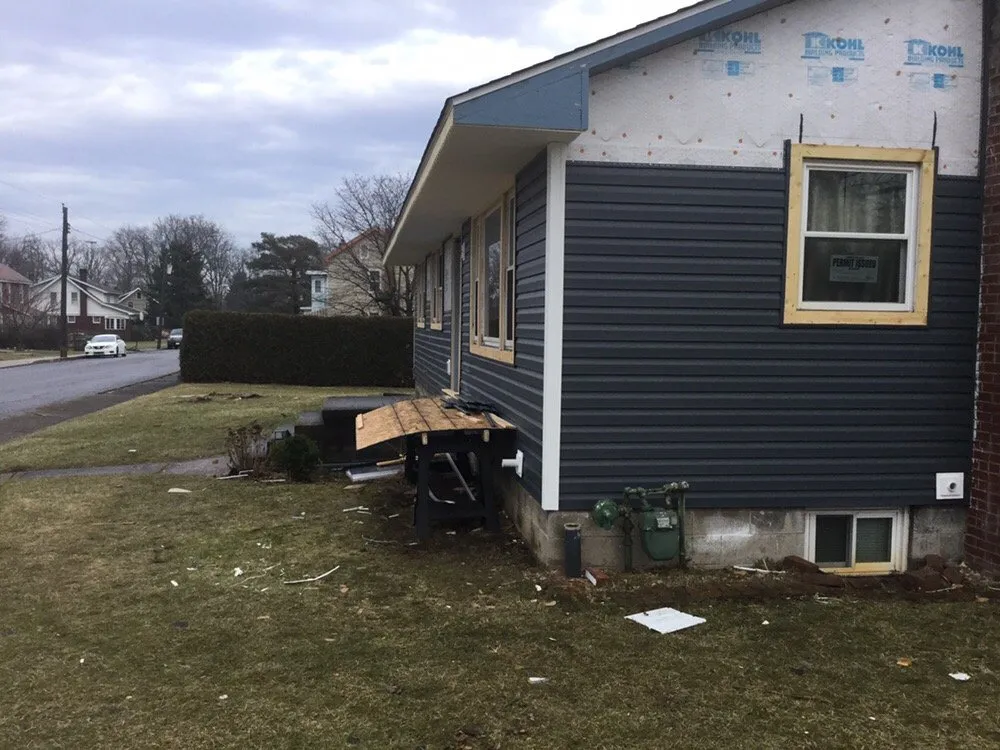 Slide of Red's Roofing & General Construction