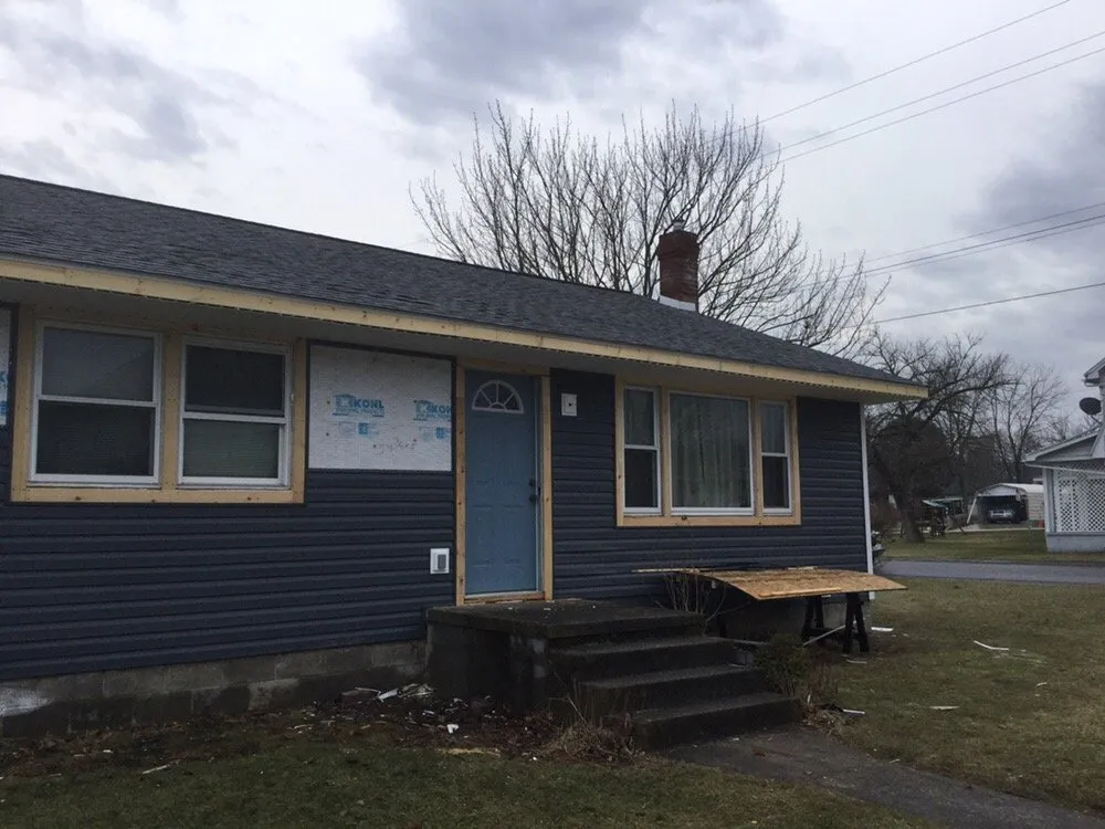 Slide of Red's Roofing & General Construction