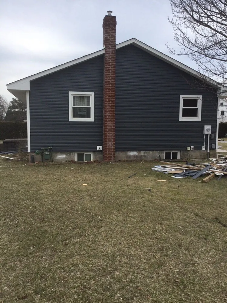 Slide of Red's Roofing & General Construction