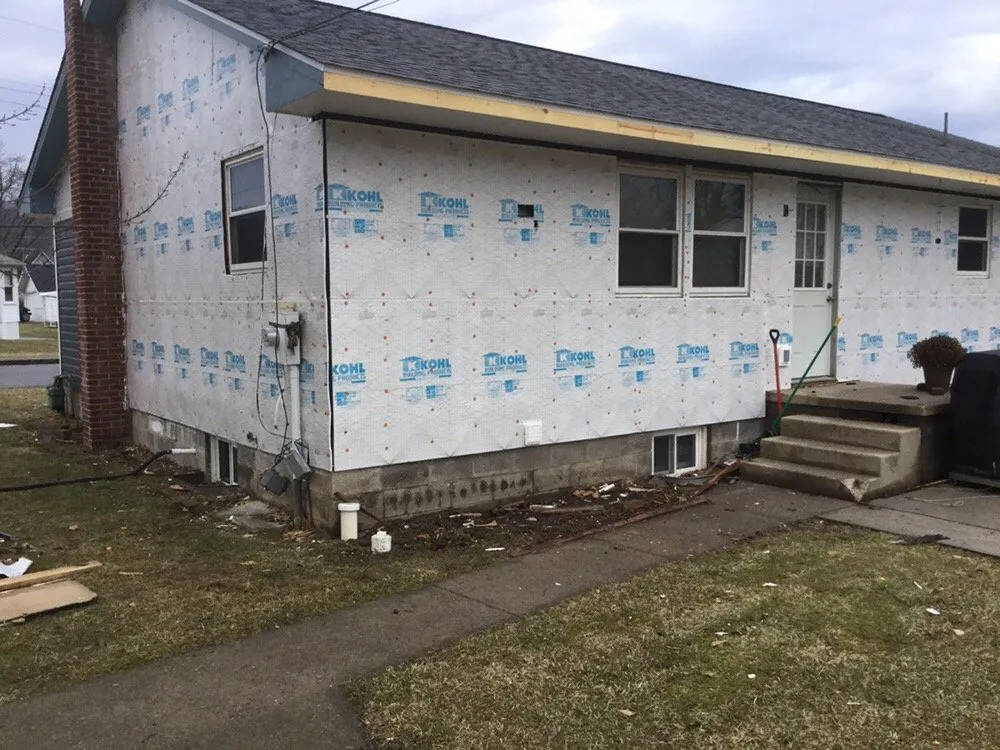 Slide of Red's Roofing & General Construction