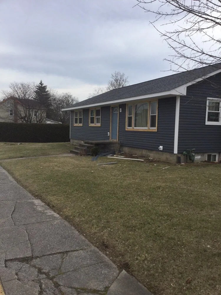 Slide of Red's Roofing & General Construction