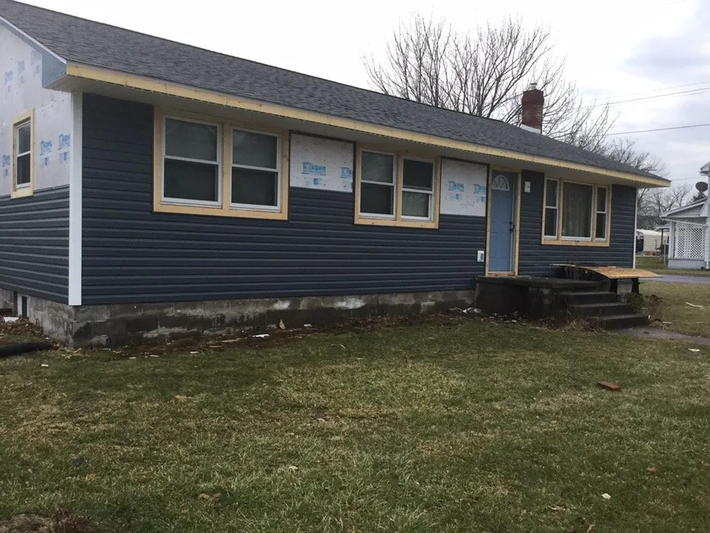 Slide of Red's Roofing & General Construction