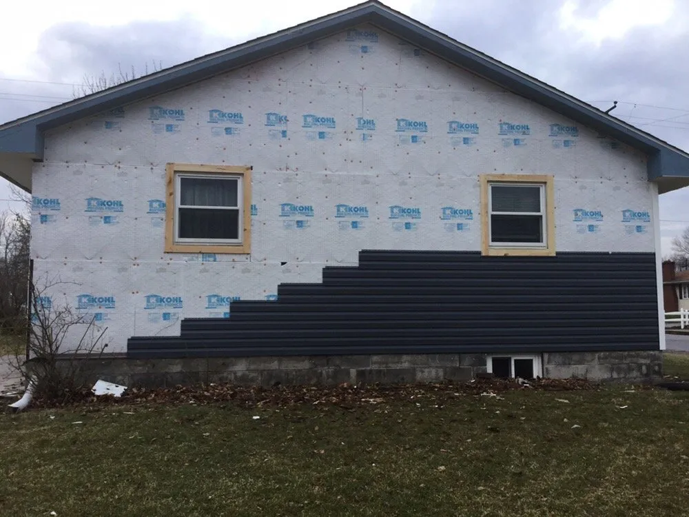 Slide of Red's Roofing & General Construction