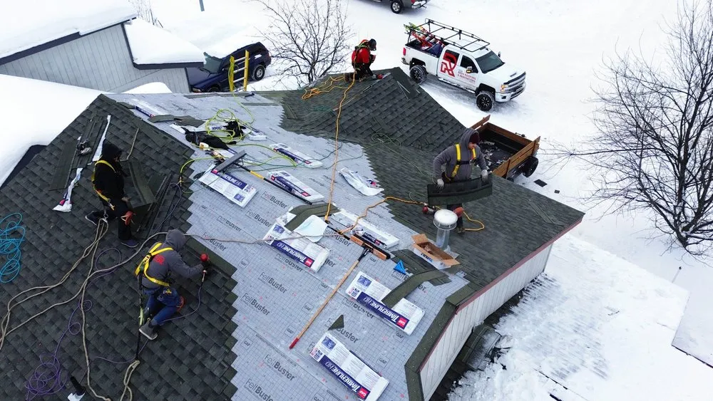 Slide of Reds Roofing & Renovations