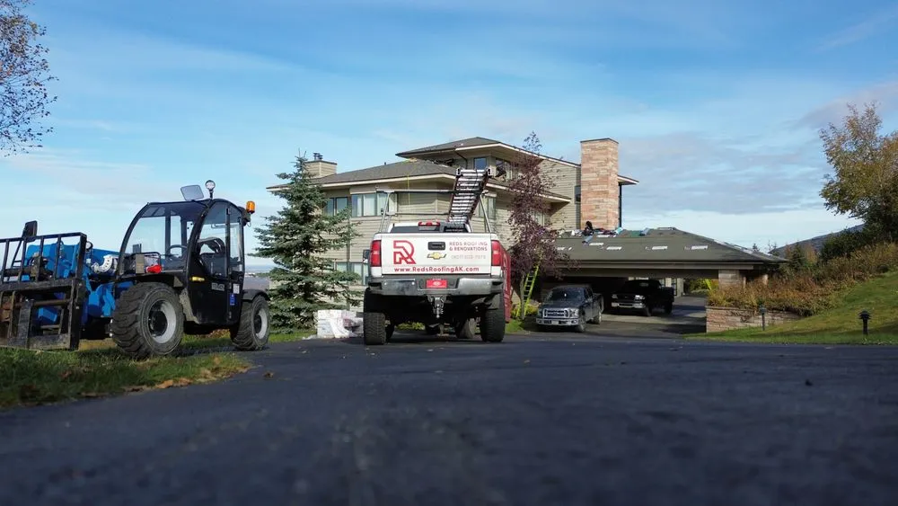 Slide of Reds Roofing & Renovations