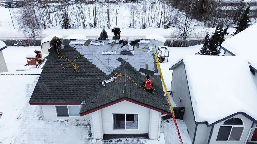 Slide of Reds Roofing & Renovations