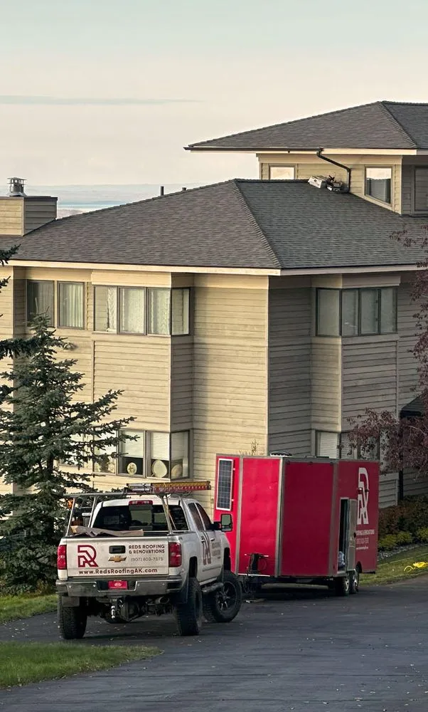 Slide of Reds Roofing & Renovations