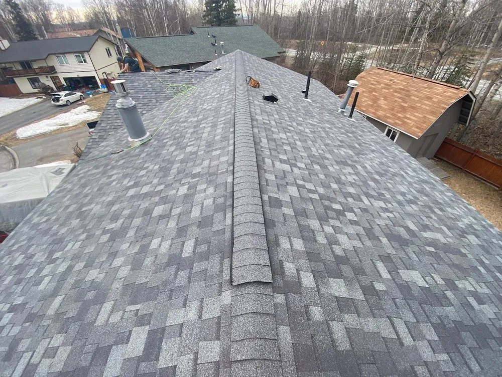 Slide of Reds Roofing & Renovations