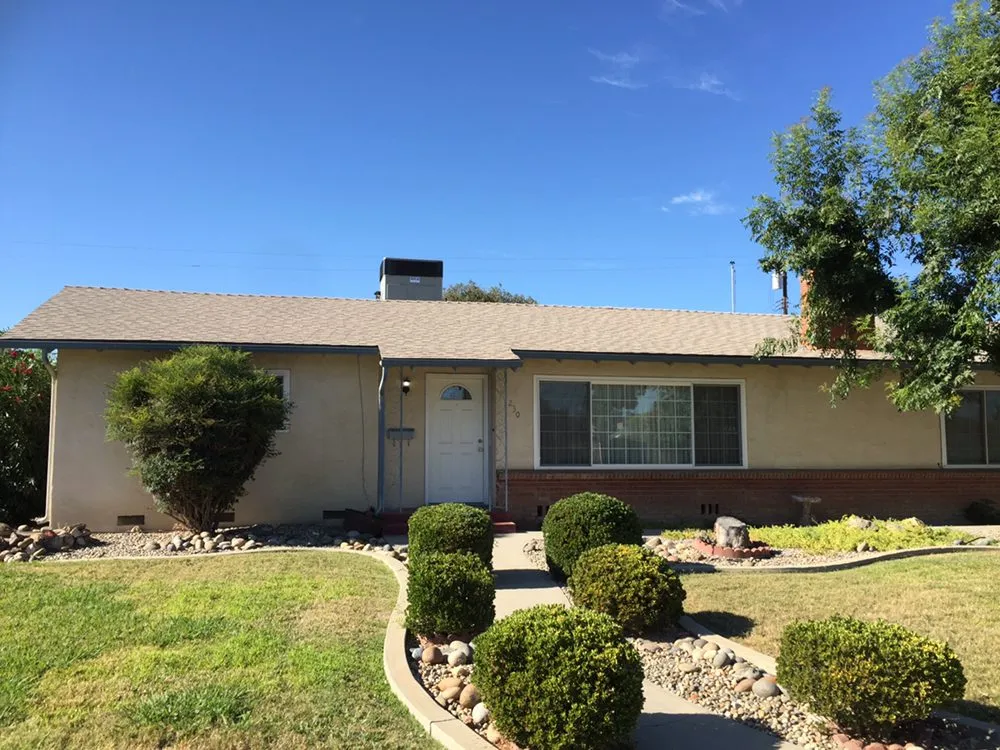 Slide of Red's Roofing