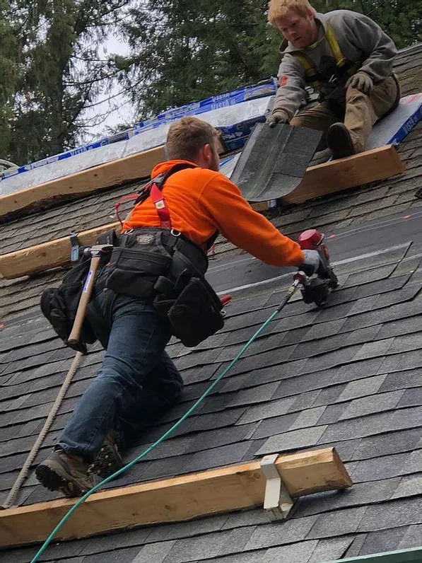 Slide of Reed's Roofing & Remodel