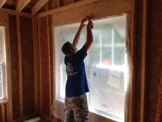 Professional storm damage roof repair with free inspection in Belfry, KY by Reed's Sprayfoam Insulation