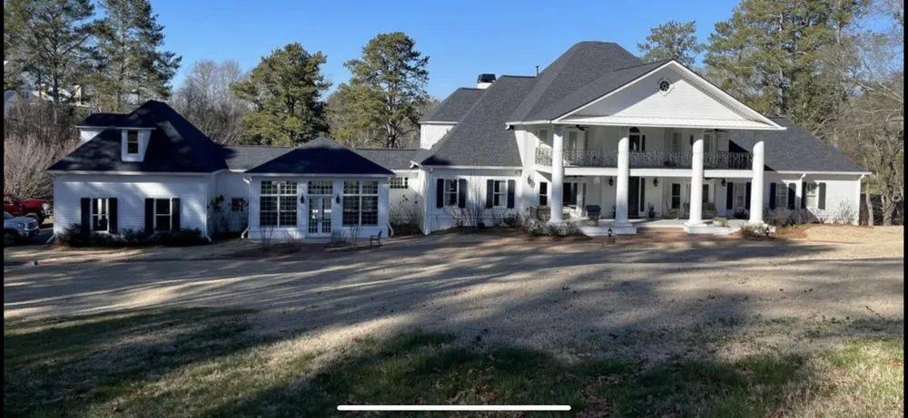 Slide of Reel Roofing and Construction