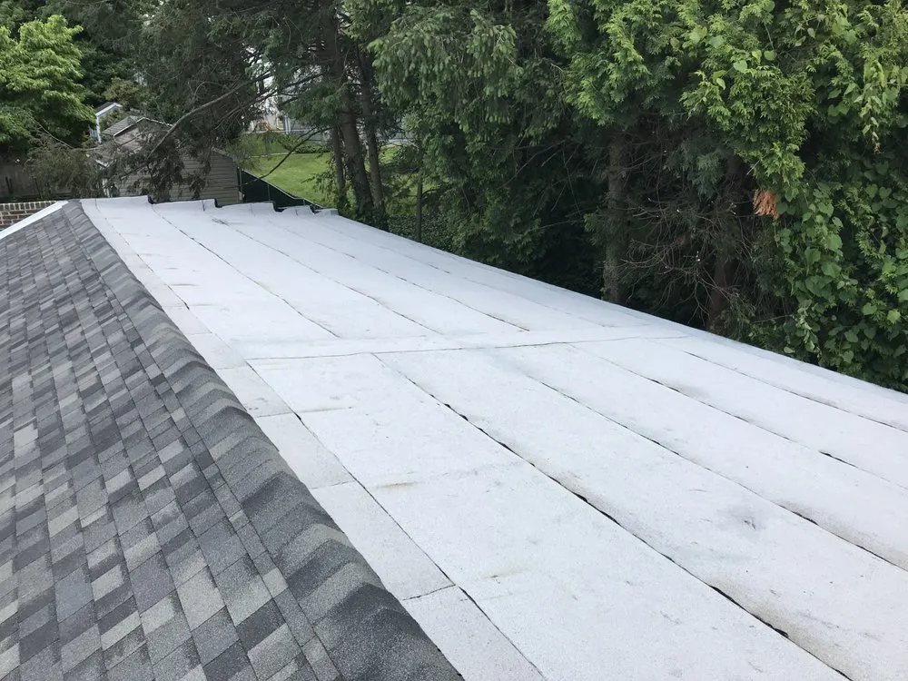 Slide of Reeves Roofing