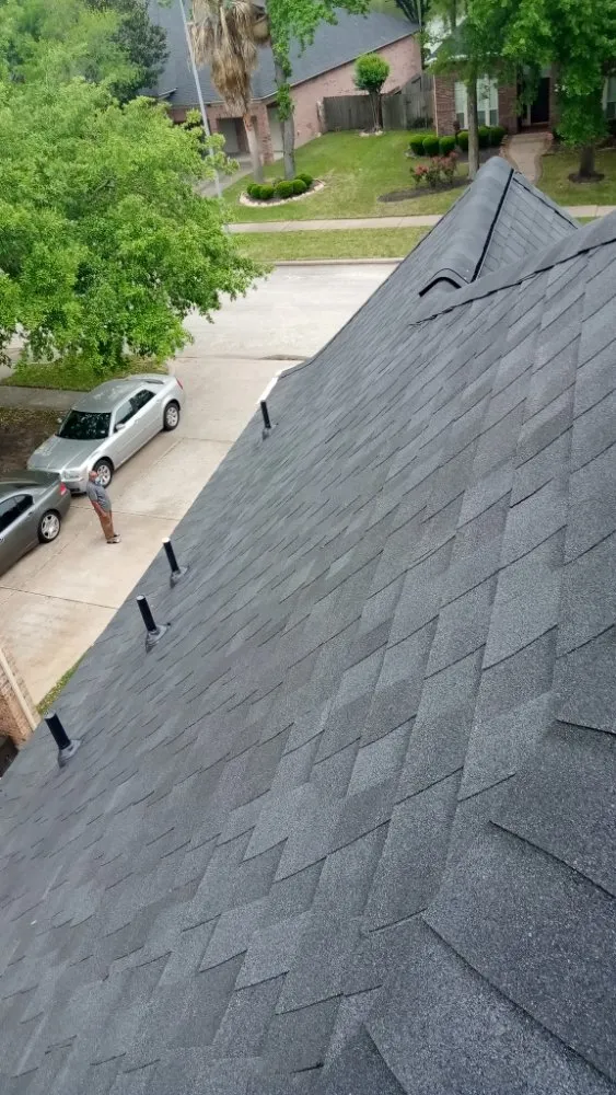 Slide of Refined Roofing & Construction