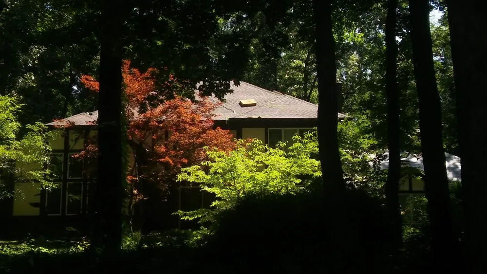 Slide of Reflections Roofing and More