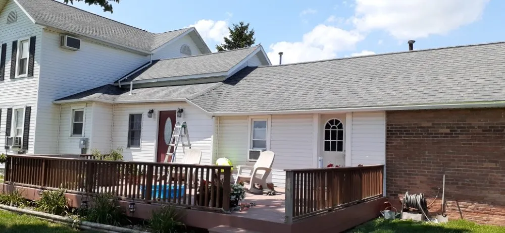 Slide of Reflections Roofing and More