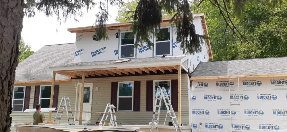 Slide of Reflections Roofing and More