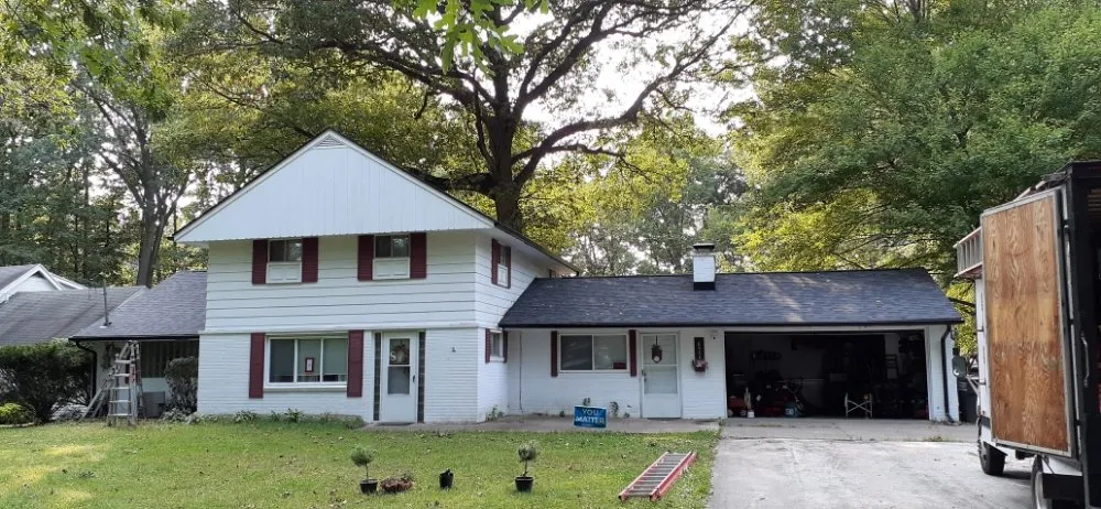 Slide of Reflections Roofing and More