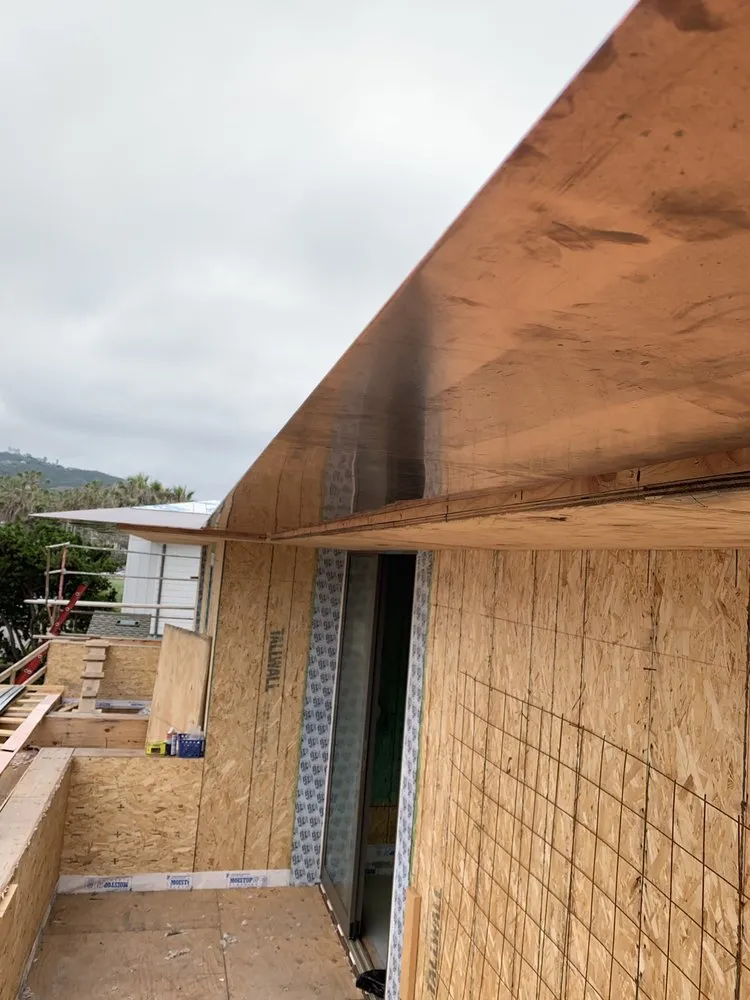 Slide of Regan Roofing