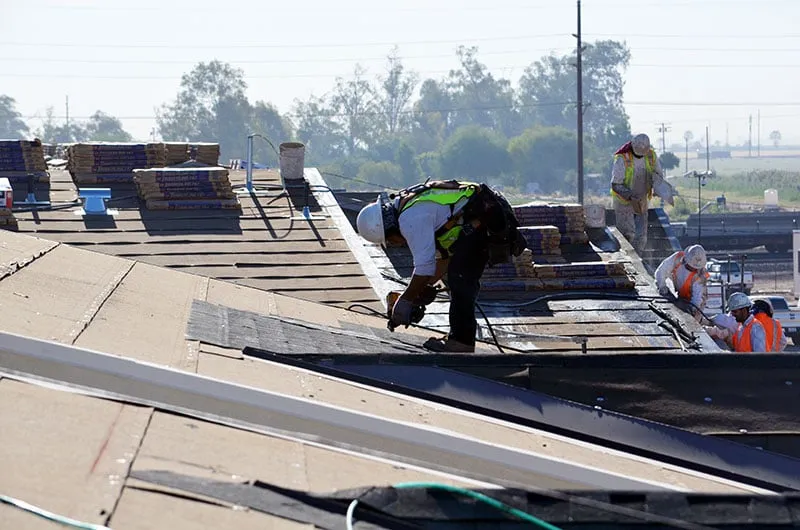 Slide of Regan Roofing