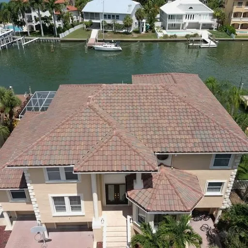 Slide of Reggie Reed Roofing