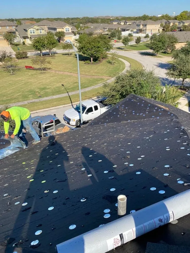 Slide of Regio's Roofing