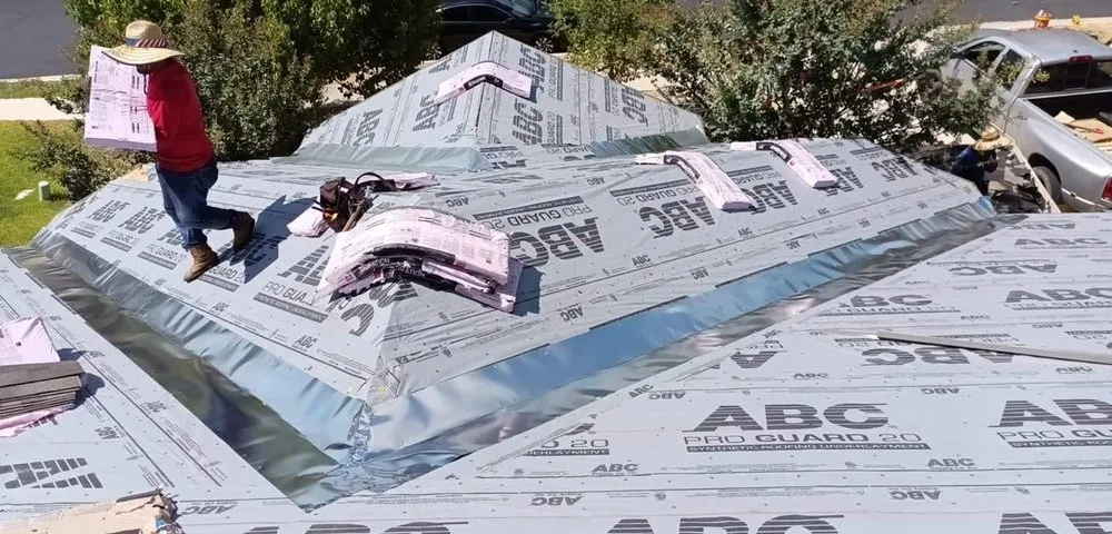 Slide of Regio's Roofing