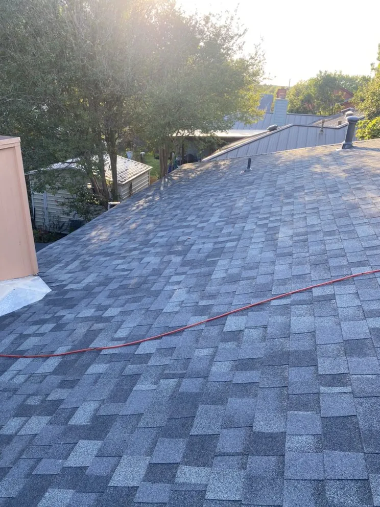 Slide of Regio's Roofing