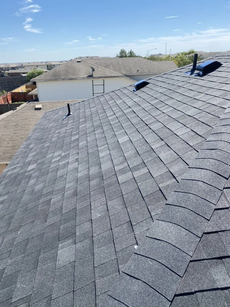 Slide of Regio's Roofing