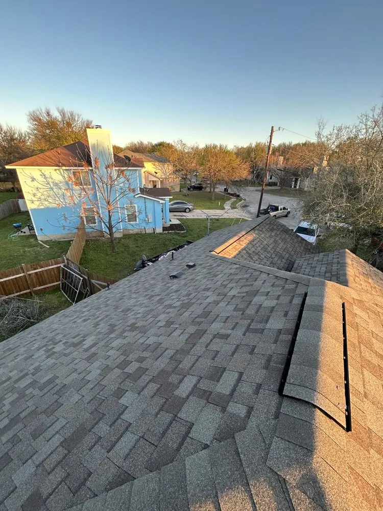 Slide of Regio's Roofing