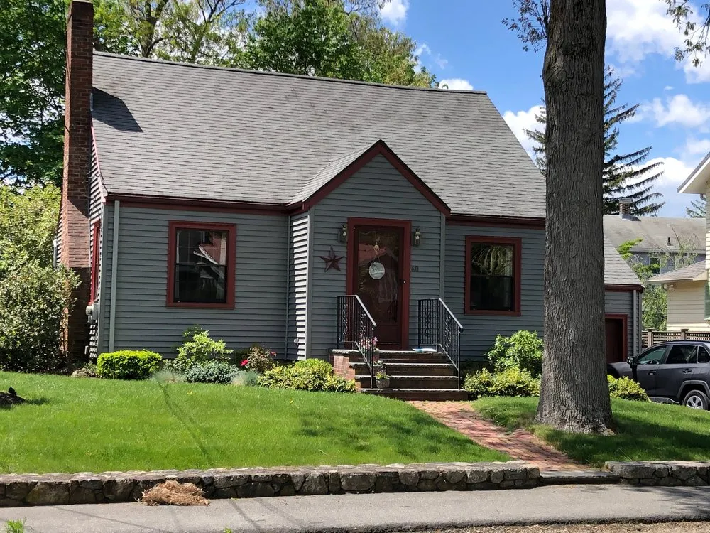 Slide of REI Roofing