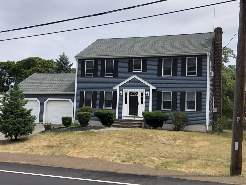 Slide of REI Roofing