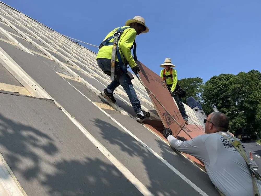 Slide of REI Roofing
