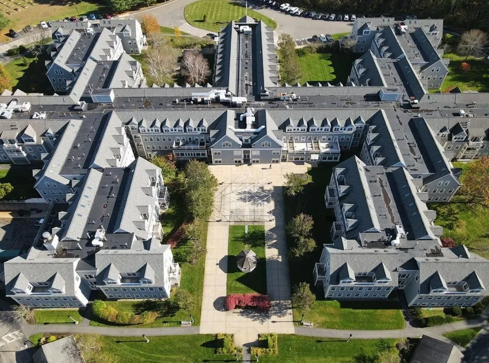 Slide of REI Roofing