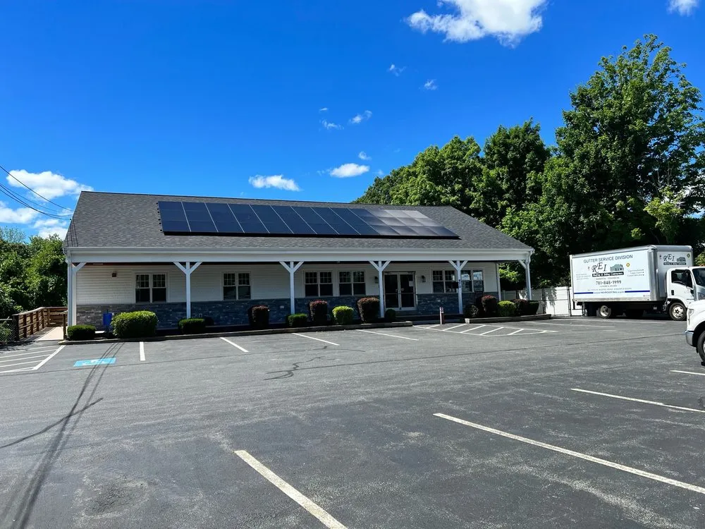 Slide of REI Roofing
